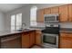 Well-equipped kitchen featuring stainless steel appliances and granite countertops at 3640 Chateau Meadow St, Las Vegas, NV 89129