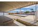 A covered patio with tile flooring overlooks the covered pool at 4409 Cinderella Ln, Las Vegas, NV 89102