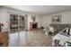 Inviting living room with tiled floors, a decorative fireplace, and sliding glass doors leading to the outdoors at 4409 Cinderella Ln, Las Vegas, NV 89102