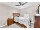 Bedroom with carpet flooring, window and a dresser, creating a cozy atmosphere at 4822 Jade Ridge St, North Las Vegas, NV 89081