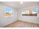 Bedroom featuring natural light, wood floors, and a calming atmosphere at 4954 Palmyra Ave, Las Vegas, NV 89146