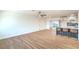 Open concept living room flows into the kitchen with modern bar stool seating at 4954 Palmyra Ave, Las Vegas, NV 89146