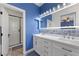 Bathroom featuring double vanity, mosaic backsplash, and a separate walk-in shower at 511 Via Ripagrande Ave, Henderson, NV 89011