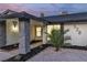 Home featuring a well-manicured front yard with unique rock features and desert foliage at 528 Sheffield Dr, Henderson, NV 89014