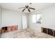 Bedroom with a ceiling fan and a window with natural light at 557 Liverpool Ave, Henderson, NV 89011