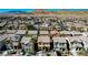 An aerial view of a residential area with desert mountains in the background at 569 Brompton St, Las Vegas, NV 89178