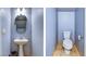 Powder room features a pedestal sink, a toilet, and tiled flooring at 569 Brompton St, Las Vegas, NV 89178