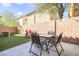 Backyard patio area with table and chairs, offers a perfect space for outdoor dining and relaxation at 569 Brompton St, Las Vegas, NV 89178