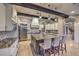 Stylish kitchen featuring a marble-topped island, stainless steel appliances, and custom cabinetry at 6 Fire Rock Ct, Las Vegas, NV 89141