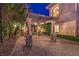 Elegant stone pergola with detailed columns and pavers, creating an inviting outdoor space at 6 Fire Rock Ct, Las Vegas, NV 89141