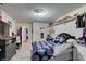 Comfortable bedroom featuring a patterned bedspread, wall decorations, and plenty of natural light at 6202 La Palma Pkwy, Las Vegas, NV 89118