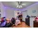 Bedroom with hardwood floor, ceiling fan and window at 6202 La Palma Pkwy, Las Vegas, NV 89118