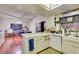 Functional kitchen features white appliances, tile floors and plenty of counter space at 6202 La Palma Pkwy, Las Vegas, NV 89118