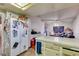 Functional kitchen features white appliances, tile floors and plenty of counter space at 6202 La Palma Pkwy, Las Vegas, NV 89118