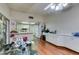 Bright kitchen with white cabinets, and view to the living area at 6202 La Palma Pkwy, Las Vegas, NV 89118