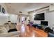 Spacious living room boasts hardwood floors, recessed lighting, and neutral color palette at 6202 La Palma Pkwy, Las Vegas, NV 89118