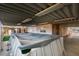 Covered above-ground pool area showcasing an enclosed backyard and covered metal awning at 6202 La Palma Pkwy, Las Vegas, NV 89118