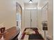 A welcoming foyer featuring tile floors, natural light, and a double-door entryway at 6944 Puetollano Dr, North Las Vegas, NV 89084