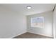 Neutral bedroom with carpet and view out the window at 7176 Southpark Ct, Las Vegas, NV 89147