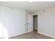 Neutral bedroom with carpet and sliding-door closet and adjoining room at 7176 Southpark Ct, Las Vegas, NV 89147