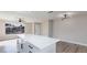 Kitchen area featuring an island with seating, providing a central gathering spot at 7176 Southpark Ct, Las Vegas, NV 89147