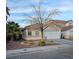 Charming single-story home with desert landscaping and a two-car garage at 7186 Cressida Ct, Las Vegas, NV 89113