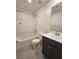 Bathroom featuring a shower-tub combo, modern vanity, and tile flooring at 7246 Copper Grove Ave, Las Vegas, NV 89113