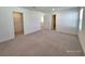 Large bedroom with walk-in closet and neutral walls at 7246 Copper Grove Ave, Las Vegas, NV 89113