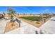 Well maintained common area with lush green lawn, seating, sidewalks and desert landscaping at 804 Ruby Sedona Ave # Lot 152, North Las Vegas, NV 89081