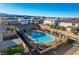 Scenic aerial shot of a community pool, highlighting the lush landscaping and inviting recreational space at 9007 Antora Summit St, Las Vegas, NV 89166