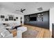 Stylish living room featuring custom built-ins and comfortable seating at 9007 Antora Summit St, Las Vegas, NV 89166