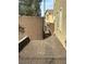 Cozy backyard features desert landscaping and hardscaped pathway with block wall surround for privacy at 945 Pomander Point Pl, Henderson, NV 89012