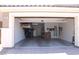 Spacious two-car garage with overhead storage racks, and access to the home's interior at 945 Pomander Point Pl, Henderson, NV 89012