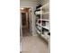 Laundry area with shelving and access to other rooms at 945 Pomander Point Pl, Henderson, NV 89012