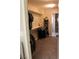 Spacious walk-in closet with ample storage and clothing racks at 945 Pomander Point Pl, Henderson, NV 89012