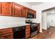 Well-equipped kitchen features stainless steel appliances, wood cabinets, and a white countertop at 10029 Netherton Dr, Las Vegas, NV 89134