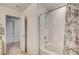 Bathroom features a tub-shower combo with marbled shower curtain at 10699 Sariah Skye Ave, Las Vegas, NV 89166