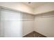 Empty walk in closet with hanging rods at 10699 Sariah Skye Ave, Las Vegas, NV 89166