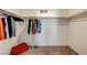 Walk in closet with carpeted floor and hanging rods at 10699 Sariah Skye Ave, Las Vegas, NV 89166