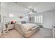 Spacious main bedroom featuring a modern bed frame, ample natural light, and neutral tones at 10699 Sariah Skye Ave, Las Vegas, NV 89166