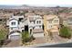 An aerial view showcases the neighborhood's layout and proximity to mountain ranges at 120 Campbelltown Ave, Henderson, NV 89015