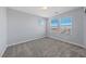 This bedroom is bathed in natural light, thanks to its multiple bright windows at 120 Campbelltown Ave, Henderson, NV 89015