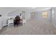 Carpeted bonus room featuring a desk and grey walls, providing a flexible space at 120 Campbelltown Ave, Henderson, NV 89015