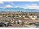 A scenic neighborhood view with city skyline and mountain backdrop under a partly cloudy sky at 120 Campbelltown Ave, Henderson, NV 89015