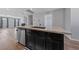 Kitchen island with stainless steel dishwasher and large sink with stylish faucet at 120 Campbelltown Ave, Henderson, NV 89015