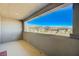 Balcony overlooking neighborhood homes with great mountain views and slider door access at 12422 Tudor Arch Dr, Las Vegas, NV 89138