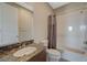 Beautiful bathroom with marble vanity and a shower and bathtub combo at 12422 Tudor Arch Dr, Las Vegas, NV 89138