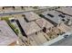 An aerial view of the exterior shows the home's roof, two-car garage, and drought-tolerant yard at 12422 Tudor Arch Dr, Las Vegas, NV 89138