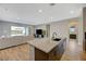 Kitchen with a large island perfect for entertaining with an open concept floor plan at 12422 Tudor Arch Dr, Las Vegas, NV 89138