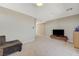 Neutral living room with comfortable seating and entertainment center at 12422 Tudor Arch Dr, Las Vegas, NV 89138